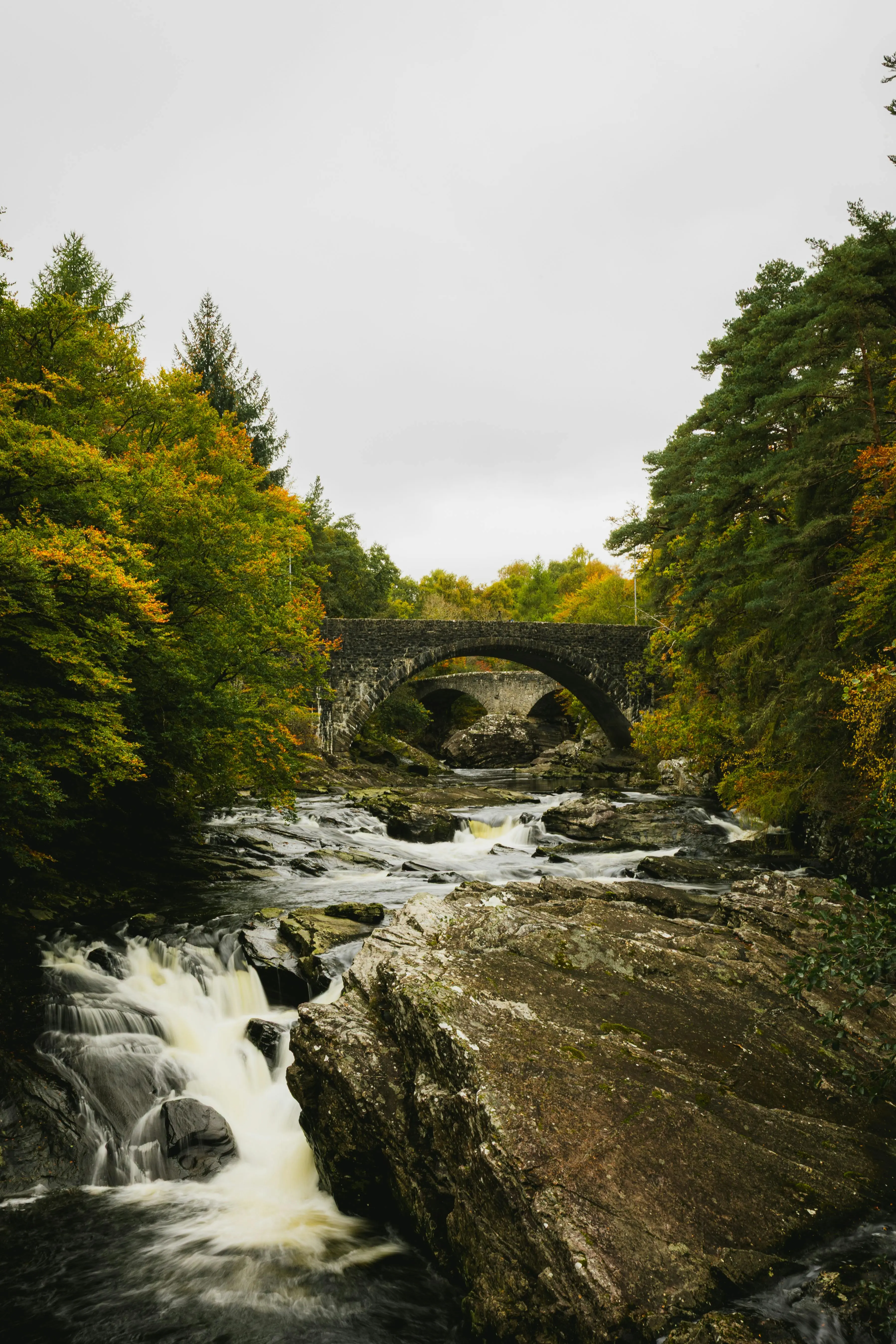 Scottish Highlands waterfall and bridge