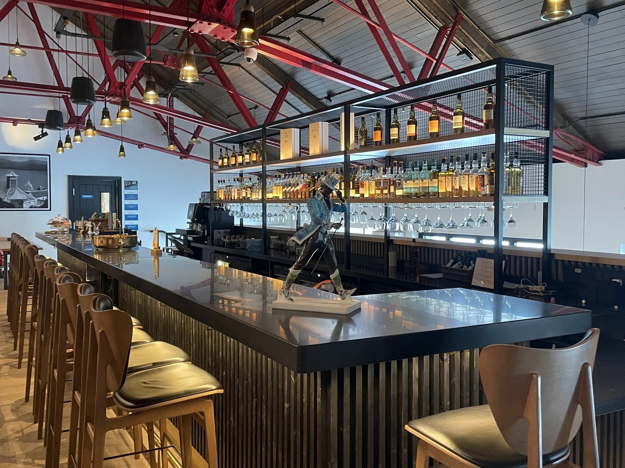 Whisky bar at Caol Ila distillery overlooking the Sound of Islay